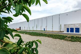 Helicopters helped build the hall. It will now produce cooling equipment